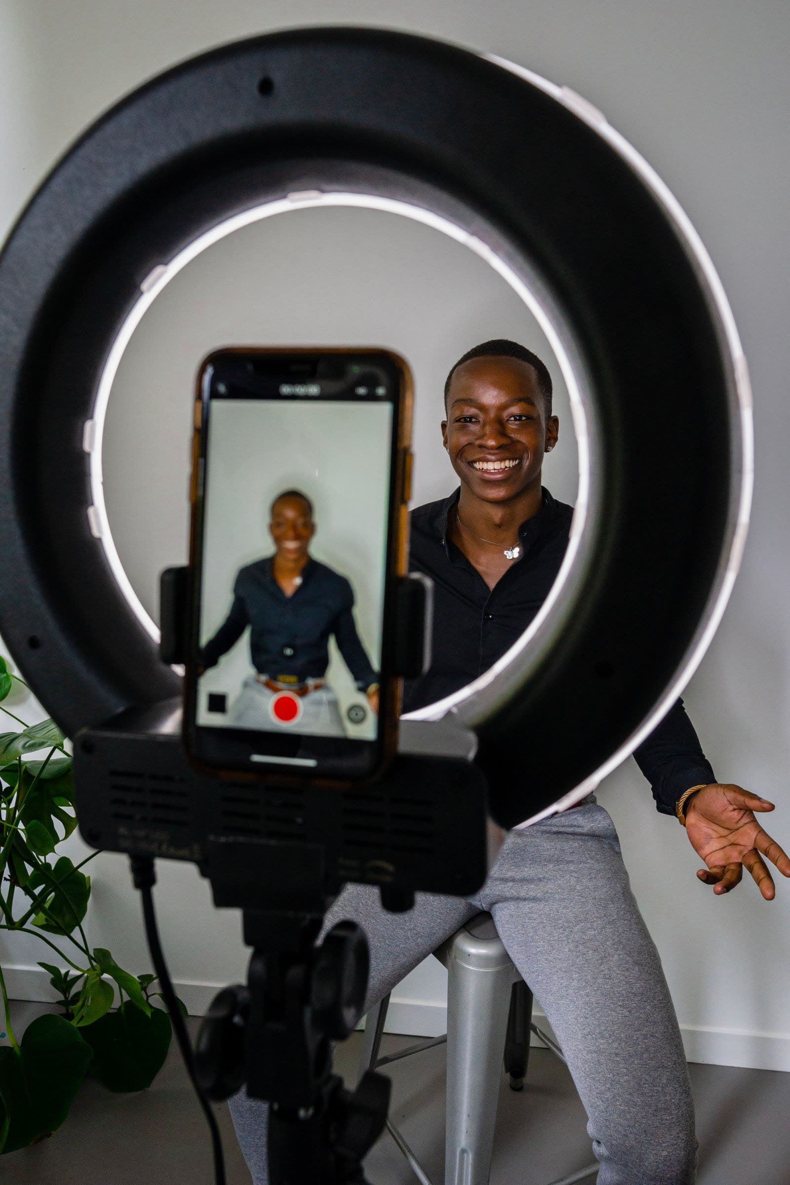 A teacher recording a lesson with a ring light
